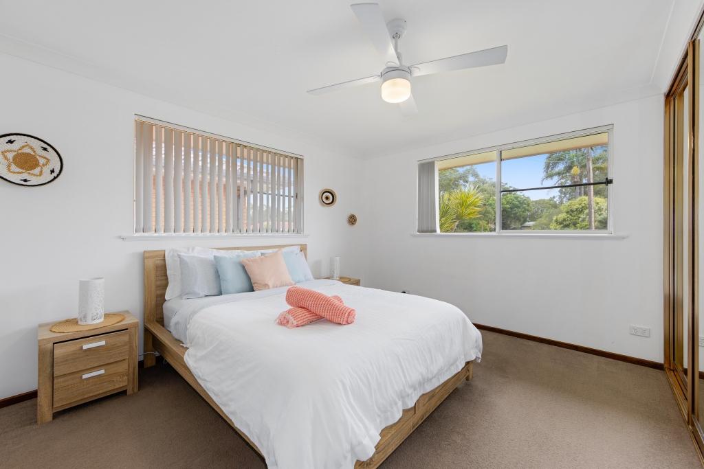 Main bedroom with ceiling fan, walk in wardrobe with access to main bathroom Gone Coastal