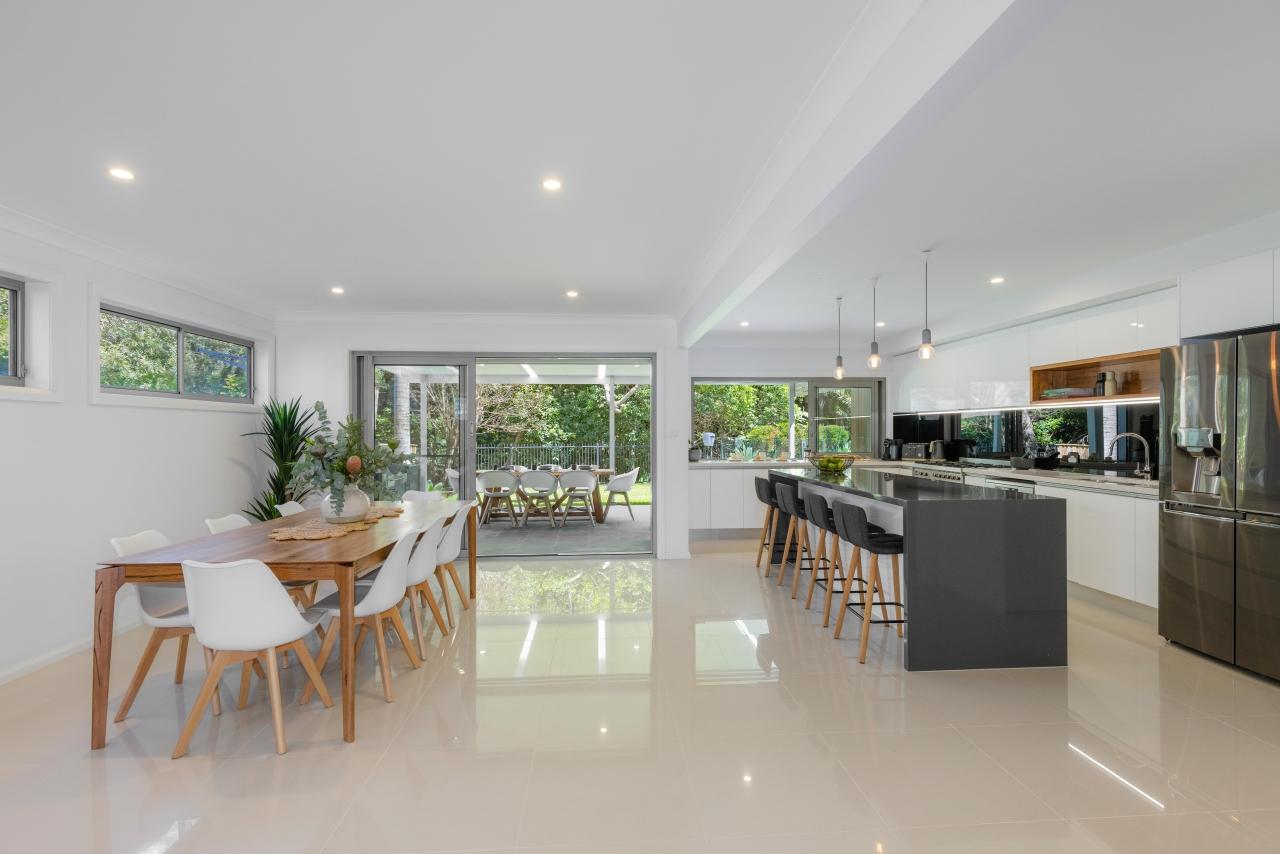 Kitchen and dining open plan living leading out to backyard. Laze at Lighthouse