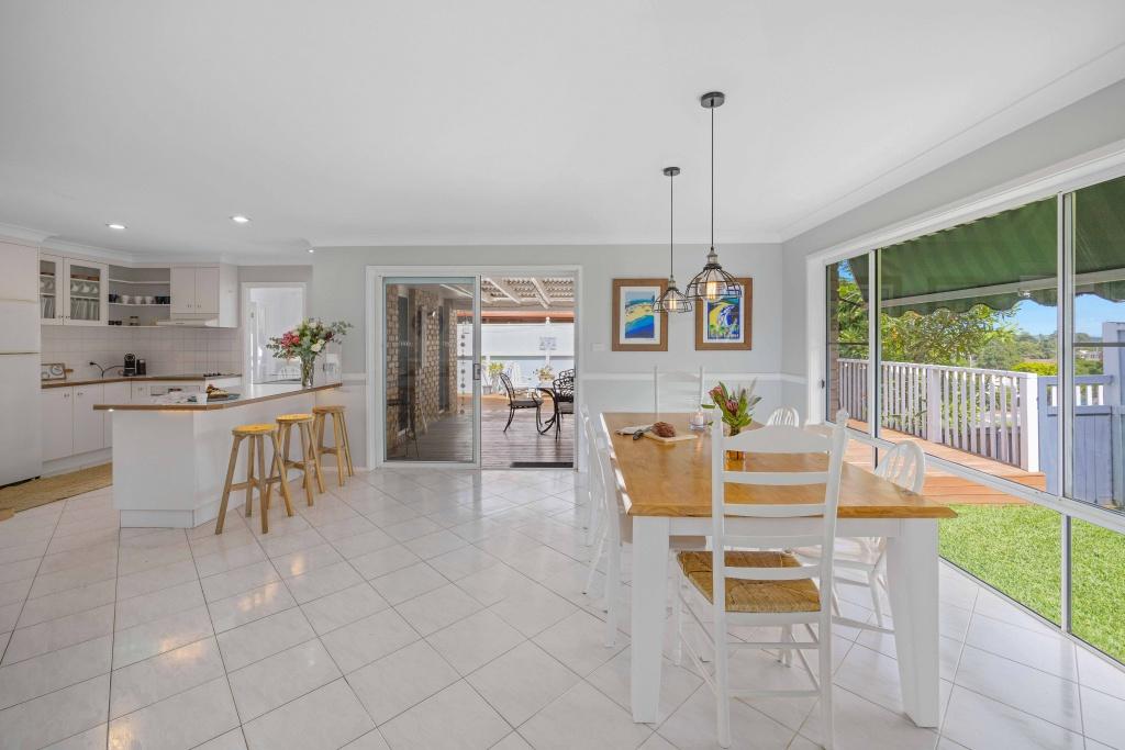 Open kitchen and dining leading out to outdoor dining area. Lighthouse Vaccay