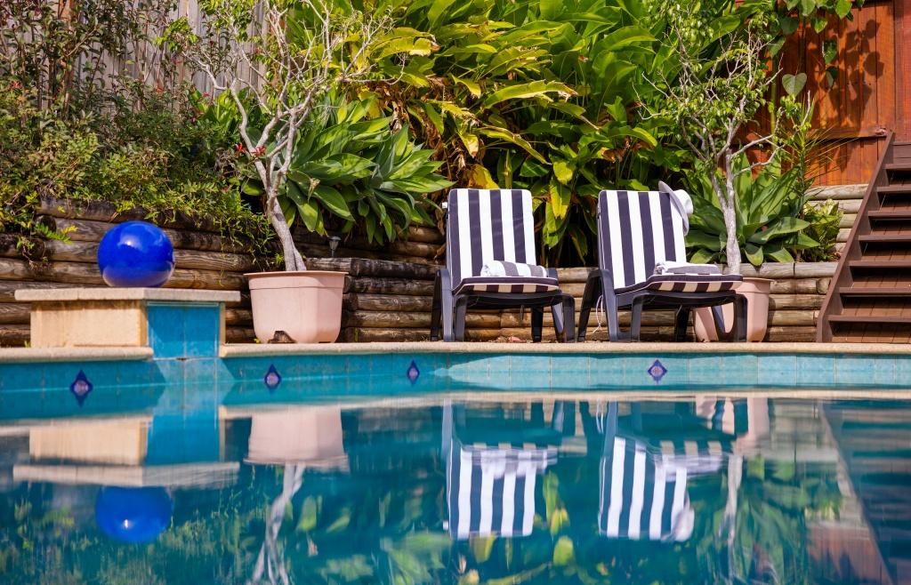 Sun chairs by the swimming pool Alkira