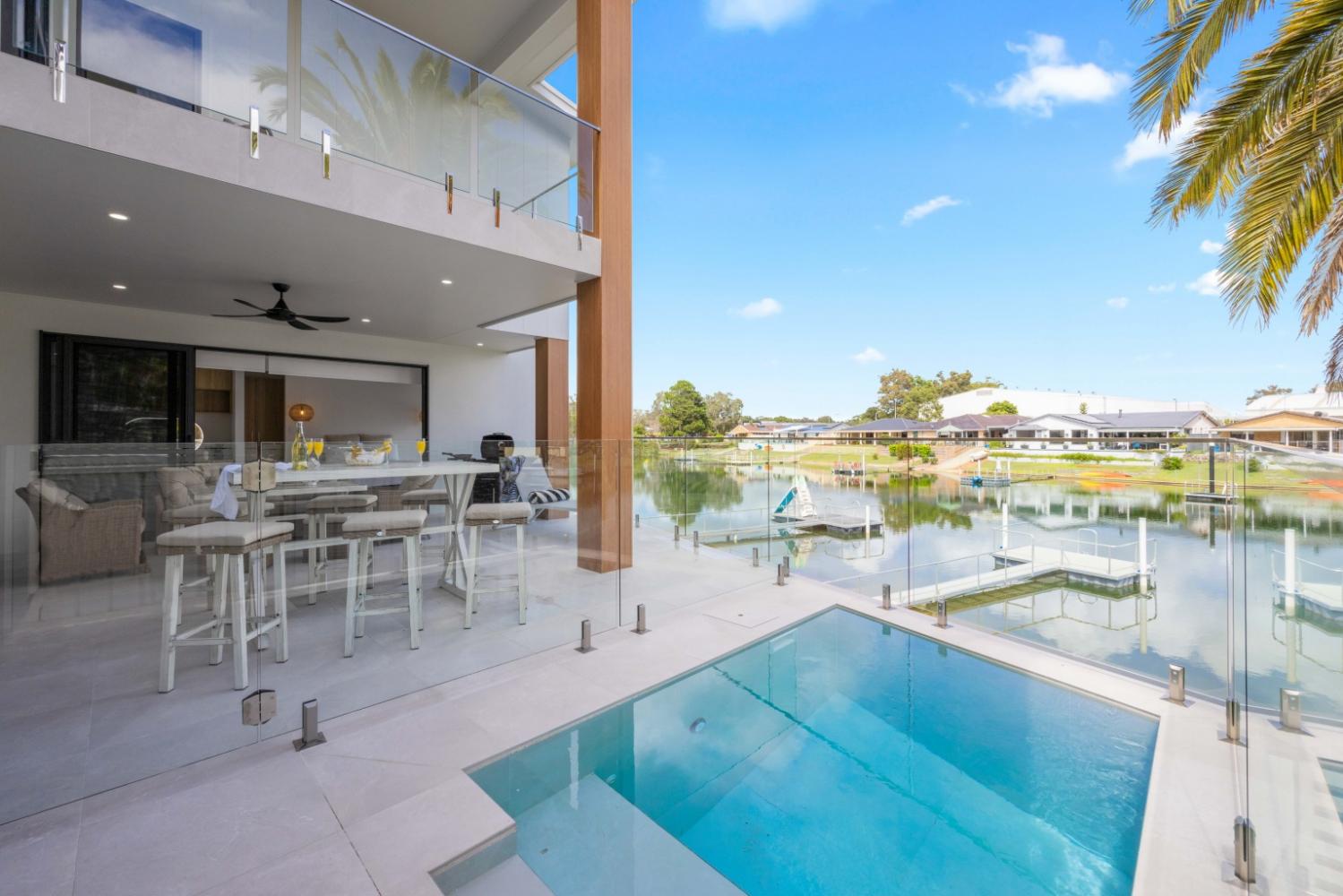 Plunge pool and outdoor living overlooking the canals. Hamiltons
