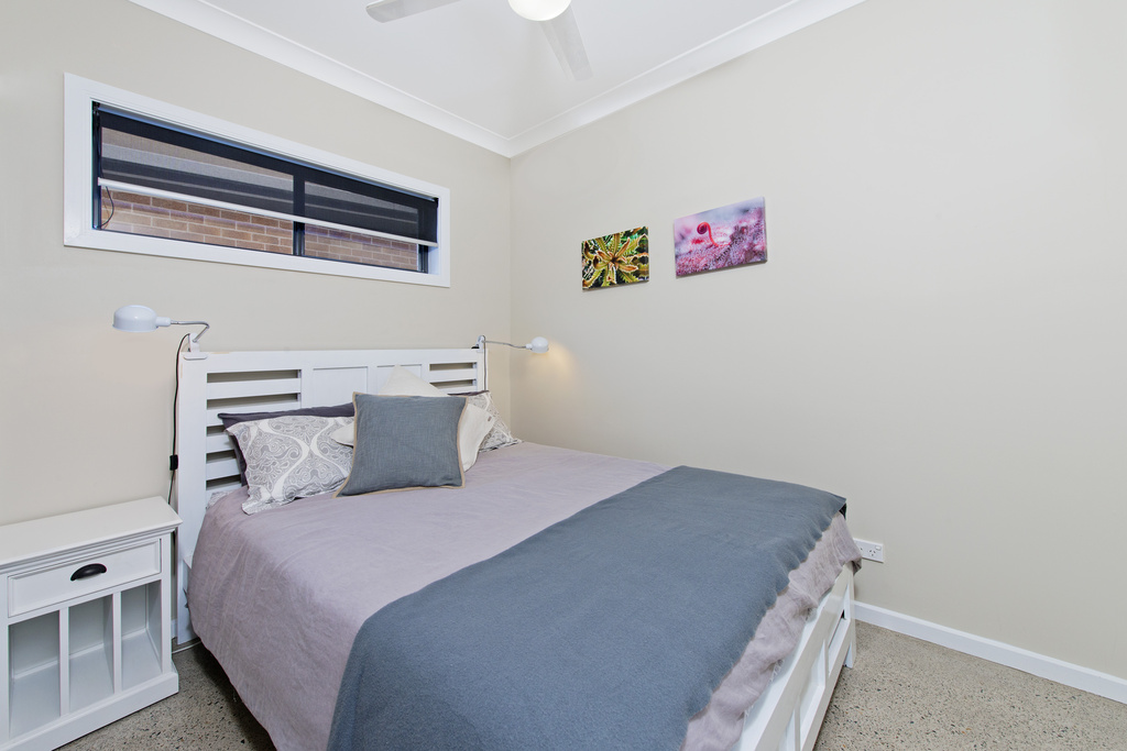 Fourth bedroom downstairs with queen bed and ceiling fan Apricari oasis by the sea Bonny Hills