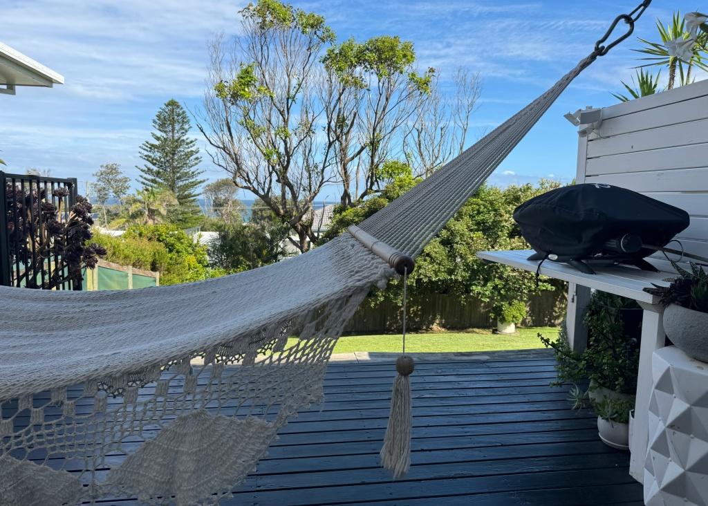Rock yourself to relaxation, surrounded by the ocean sounds, in this comfortable hammock