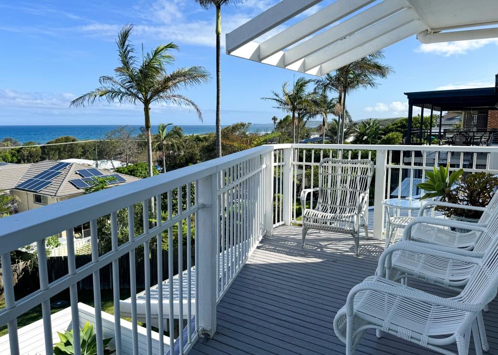 Stunning water views from the top balcony. Relax in comfortable, cane chairs