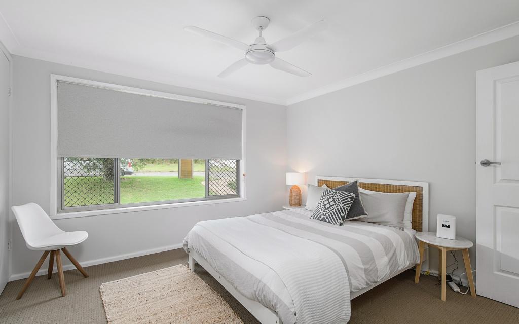 Main bedroom with Queen bed and ceiling fan, upstairs. Harrys @ Shelly Beach