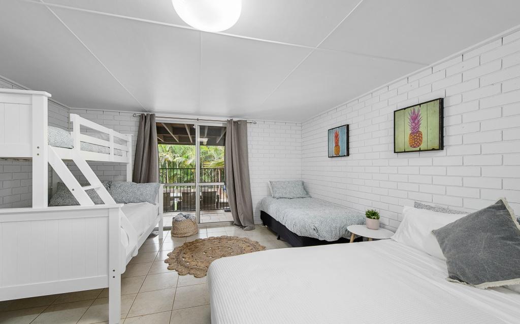 Downstairs rumpus room/ fourth bedroom with Queen bed, single bed and bunk beds- Single on top, double on bottom. Sleeps 6. Harrys @ Shelly Beach